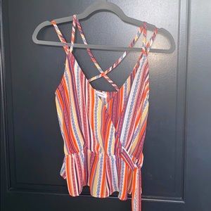 Boho Inspo peplum top with criss-cross straps